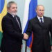 Russian Prime Minister Vladimir Putin (R) greets Brazilian President Luis Inacio Lula da Silva during their meeting on May 14, 2010 in Moscow. AFP PHOTO / ALEXEY DRUZHININ (Photo by ALEXEY DRUZHININ / RIA NOVOSTI / AFP)